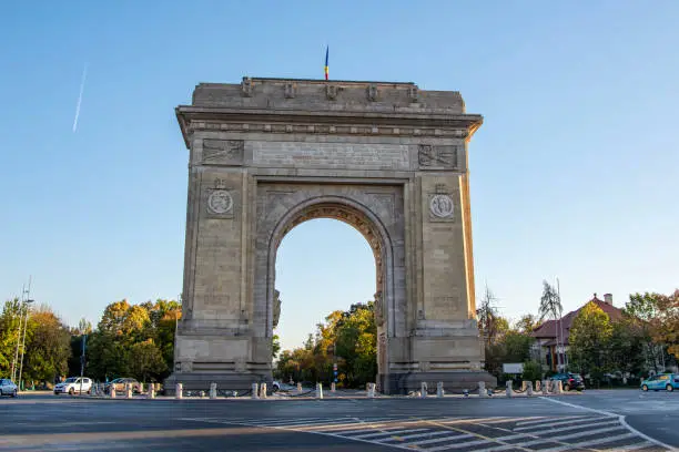 Photo of The Arc de Triomphe (in Roumain, Arcul de Triumf) is a monument located in the city of Bucharest, capital of Roumanie.