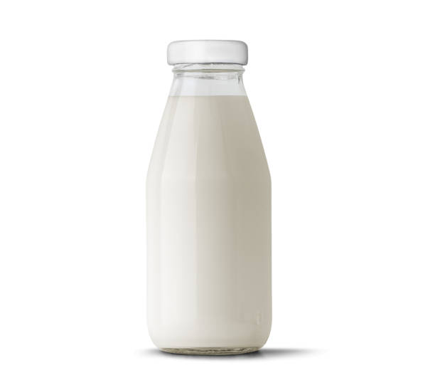 istock Milk in glass bottle isolated on white 1933070187