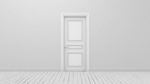istock Closed white door in a bright room. 1933093629