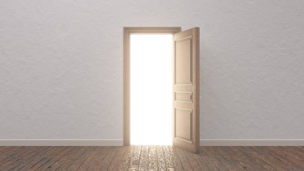 istock Light shines from door opening in a bright room. 1933096754