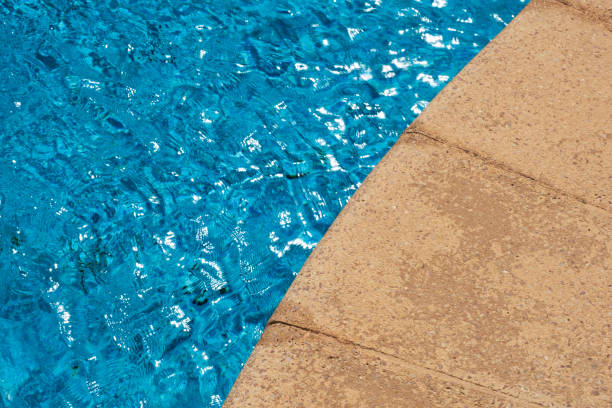 istock Blue waves ripples and splashes and pool with a side. 1933124737
