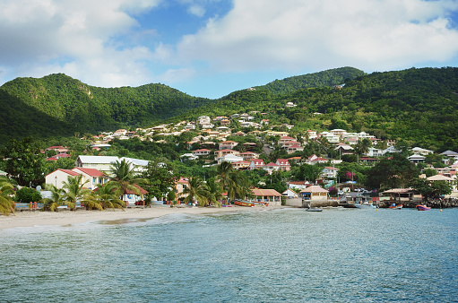 Beach and village of Les Anses D'Arlet with fishing boats, Martinique