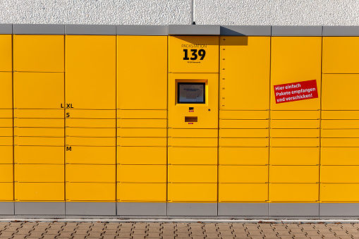 Wall of safe deposit boxes inside a bank vault