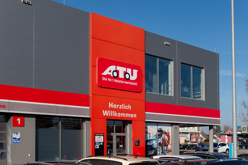 Neumarkt, Germany - January 11, 2024: Building of the A.T.U (Auto-Teile-Unger) car repair store in the Bavarian town Neumarkt, Germany. A retailer in the branches car repairs, car accessories and car parts, founded in 1985 and based in the small town of Weiden.