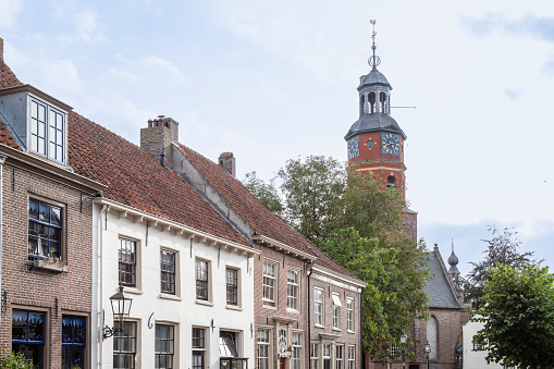 Small picturesque town of Buren in the Betuwe, with the church tower of the Sint Lambertuskerk in the background.