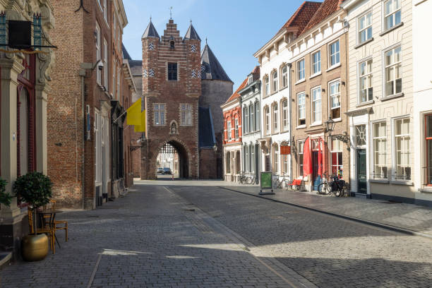 prison gate - lievevrouwepoort, in the center of bergen op zoom. - bergen op zoom stockfoto's en -beelden