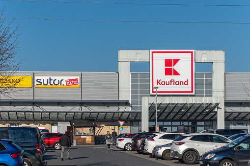 Steinheim, Germany - February, 24th - 2024: View of a large shopping center with public parking lots.