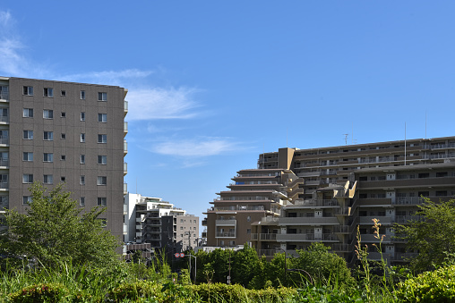 Housing complexes, blue sky background. Tokyo Japan.