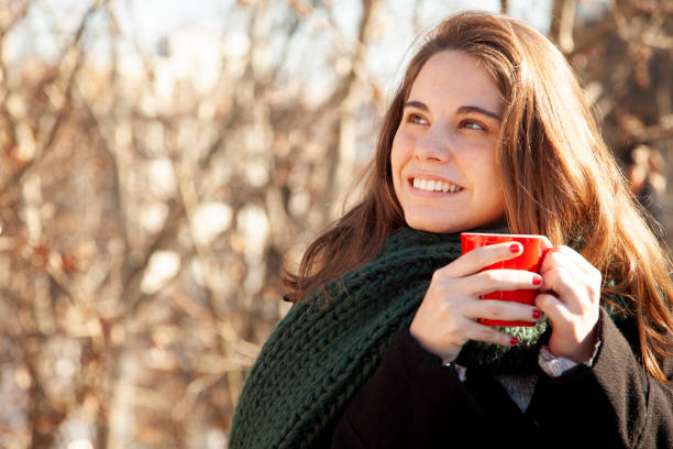 istock Young woman drinking coffee 1933235349