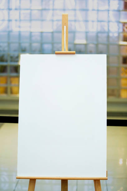 istock Wooden easel with a blank board 1933305970