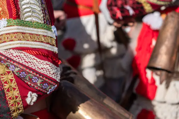 Photo of selective focus, detail of the jacket of a peliqueiro traditional mask of the carnival of Laza. Orense, Galicia, Spain