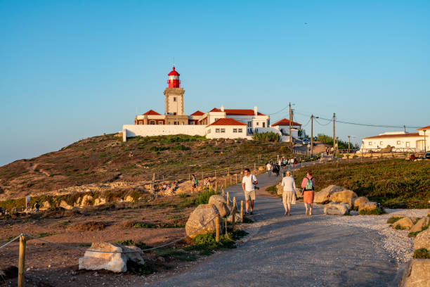 westernmost point of continental europe, cabo da roca at dusk, sintra, portugal - sintra sunset cross outdoors ストックフォトと画像