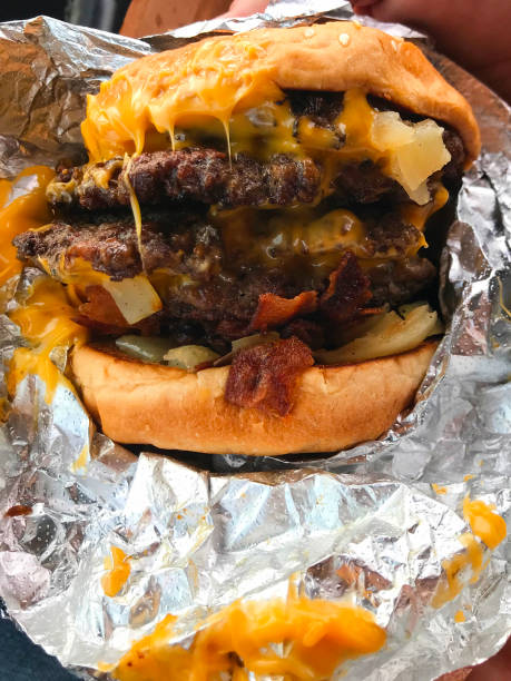 istock Quadruple cheese burger with onion and bacon 1933525169