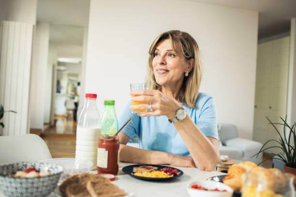 istock Woman is enjoying breakfast 1933550101