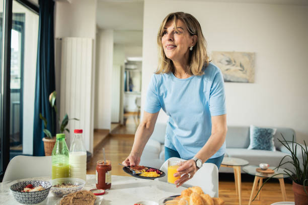 istock Woman is enjoying breakfast 1933550257