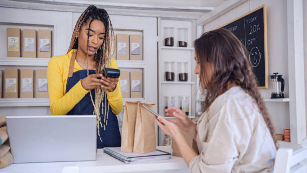 istock Shopping in eco-friendly coffee shop. 1933552241