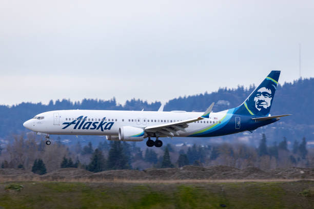 Portland, Oregon, USA - January 1, 2024: An Alaska Airlines Boeing 737 MAX-9, with registration number N982AK, comes in for landing at Portland International Airport.