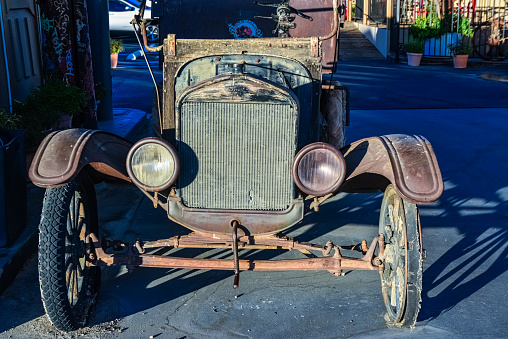 CALIFORNIA, USA - NOVEMBER 26, 2019: an old badly restored car, decoration in the design of the local area of ââthe hotel, California