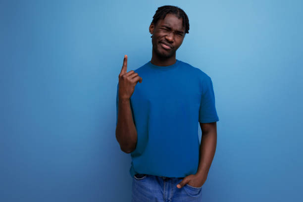 istock cool confident african young man in t-shirt 1933589180