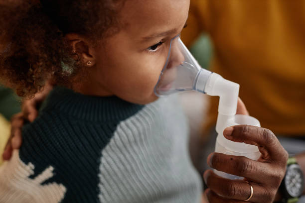 istock Preschool Girl during Inhalation Therapy 1933645843