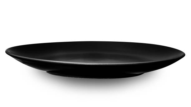 istock Black circle ceramics plate isolated on white background. 1933687594