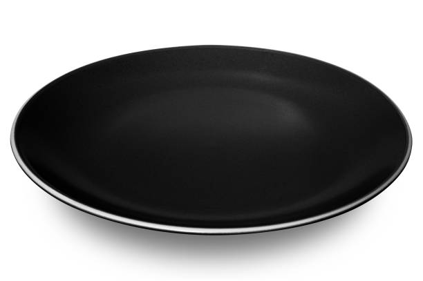 istock Black circle ceramics plate isolated on white background. 1933688099
