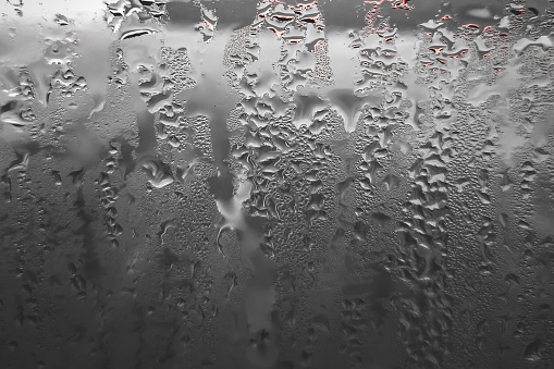 abstract texture of window glass with water drops. defocused