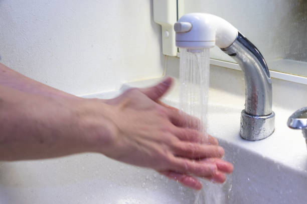 wash hands in the washbasin