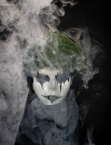 istock Smoking mask with moss helmet and scary face 1933898664
