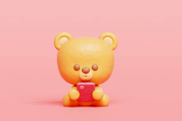 istock 3D cute bear watching on smartphone, Cartoon animal character, 3D rendering. 1933910191