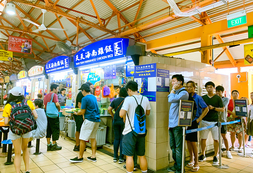Chinatown, Singapore - July 16, 2049 : Customers Line Up To Buy Food Inside Of Maxwell Food Centre In Chinatown. Maxwell Food Centre Is Home To Some Of Singapore's Best Hawker Stalls.