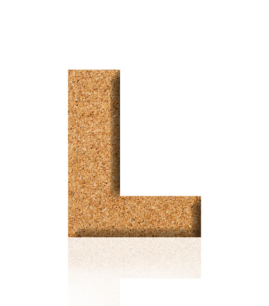 Close-up of three-dimensional cork alphabet letter L on white background.