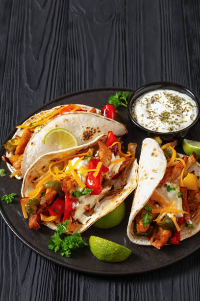 istock baked tex-mex chicken fajitas on a plate, top view 1934060413