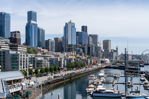 Southeast view of the Central Waterfront in Seattle, Washington, United States - June 15, 2023. The Central Waterfront of Seattle is the most urbanized portion of the Elliott Bay shore.