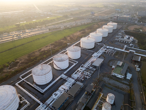 Aerial view oil and gas industrial, Refinery factory oil storage tank and pipeline steel