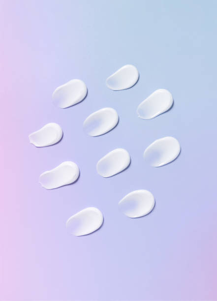 istock cosmetic smears cream texture on pastel multicolored background 1934167709