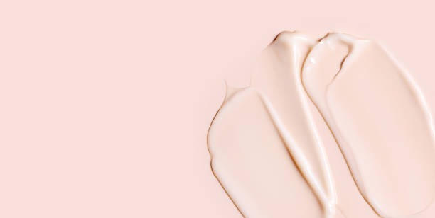 istock cosmetic smear texture on pastel beige background 1934167712