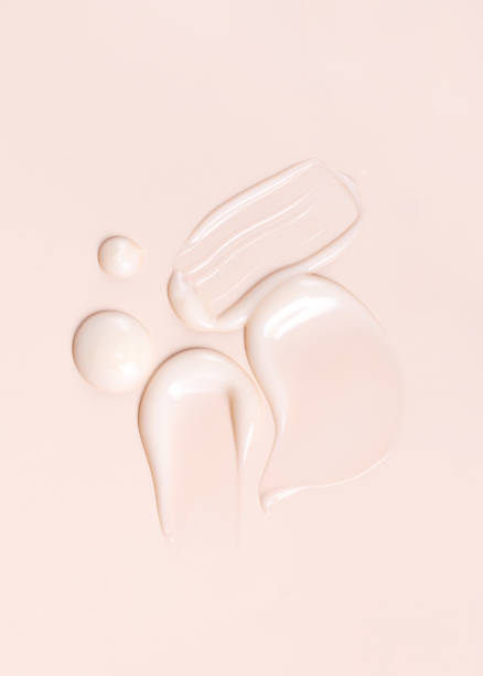 istock cosmetic smear texture on pastel beige background 1934168218