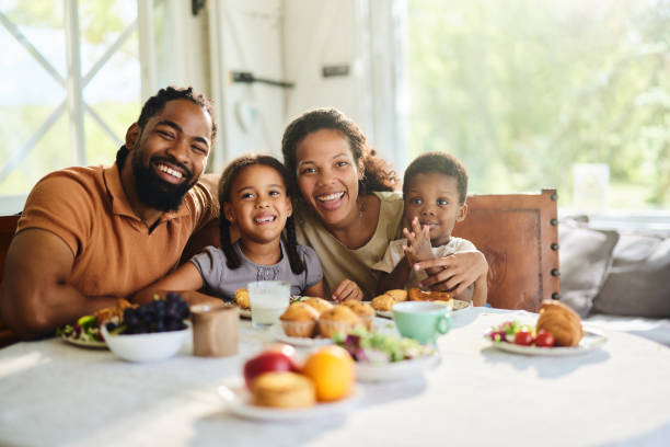 istock Happy black family during breakfast at dining table. 1934186995
