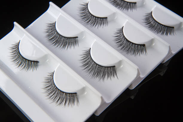 istock Fashion fake false eyelash set isolated on black background 1934204067