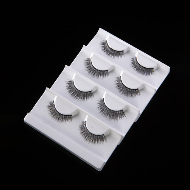 istock Fashion fake false eyelash set isolated on black background 1934204068