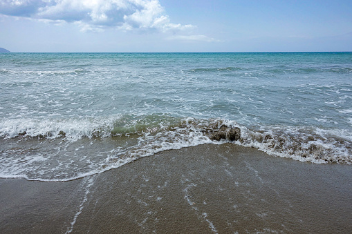 Sea waves on the sandy beach. Beautiful seascape. Panorama