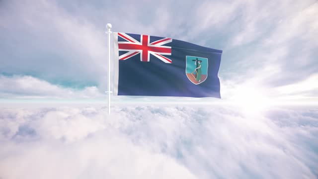 Montserrat flag waving above the clouds in slow motion, The concept of liberty, patriotism, independence day, celebration, patriotic, power. National flag waving proudly above the clouds and symbolizing freedom,