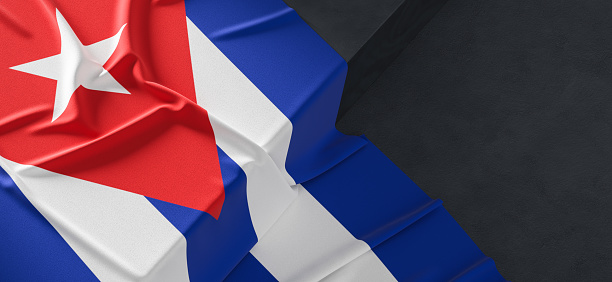 Flag of Cuba. Fabric textured Cuba flag isolated on dark background. 3D illustration