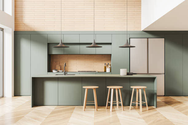 istock Stylish home kitchen interior with bar counter and cabinet with refrigerator 1934241293