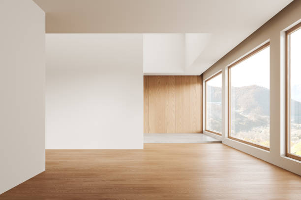 istock Light empty home living room interior with mock up wall, panoramic window 1934242358