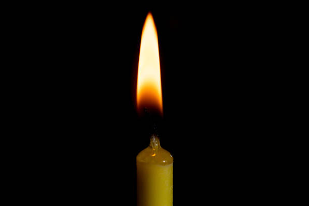 candle on the black background close up