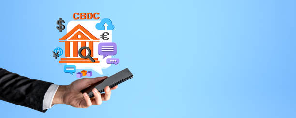 istock Man hand with smartphone and CBDC icons 1934248839