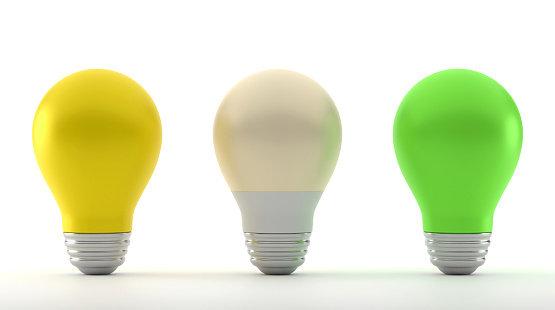 Yellow, Green And White Light Bulbs On White Background