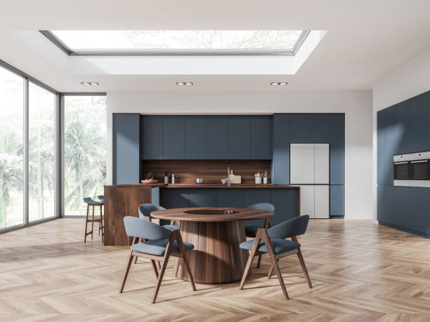 istock White and blue kitchen with island and dining table 1934264431
